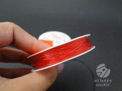 Damil elastic 0,7mm/9m - negru/rosu